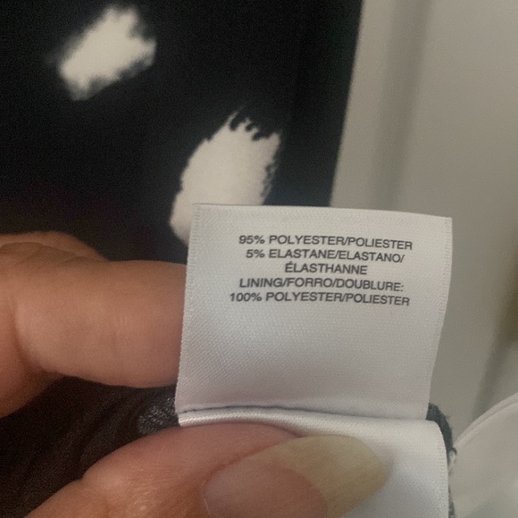 Anne Klein black asymmetrical neckline top with ivory spots. L. Lined front NWT - Picture 4 of 7